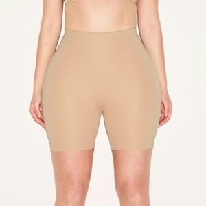 Hip enhancing padded short